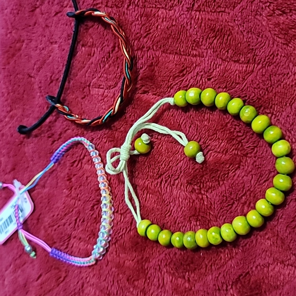 Set of 4 Sliding Knotted Friendship Style Bracelets